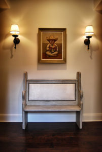 Southwest style art and wooden bench