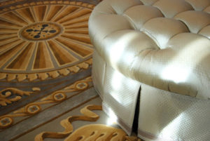 Federal style carpet design and cushion ottoman