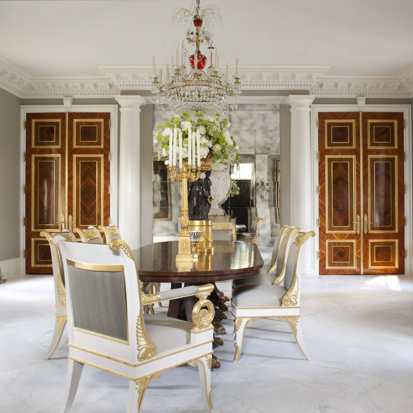 Elegant gold and white dining room interior design