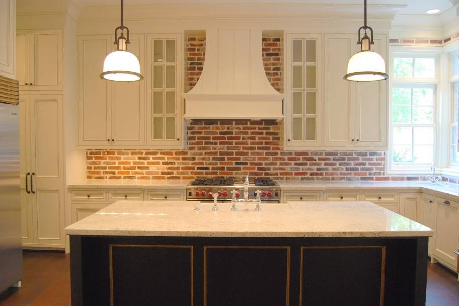 Newly remodeled kitchen with brick backsplash