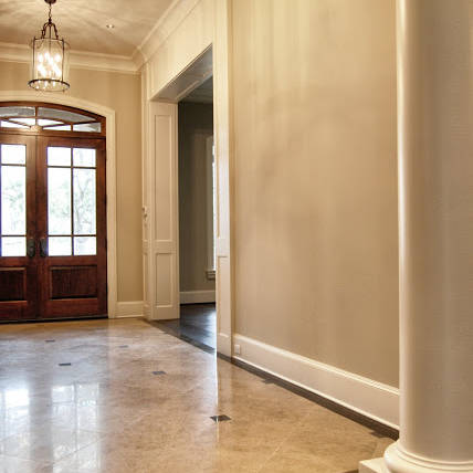Newly remodeled entryway with modern chandeliers