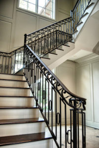New staircase with intricate metal railings