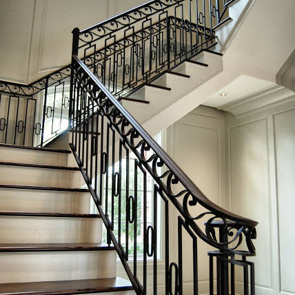 New staircase with intricate metal railings