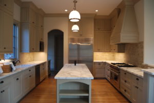 Newly remodeled kitchen with white marble countertops