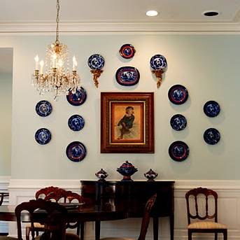 Dining room interior design with artwork on the walls