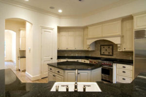 New kitchen interior design with black marble countertops