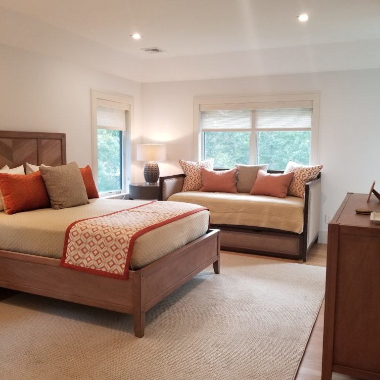 Cream and orange bedroom interior design